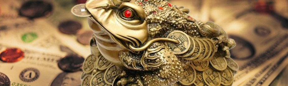 Un crapaud avec une pièce dans la bouche - un talisman pour attirer de l'argent
